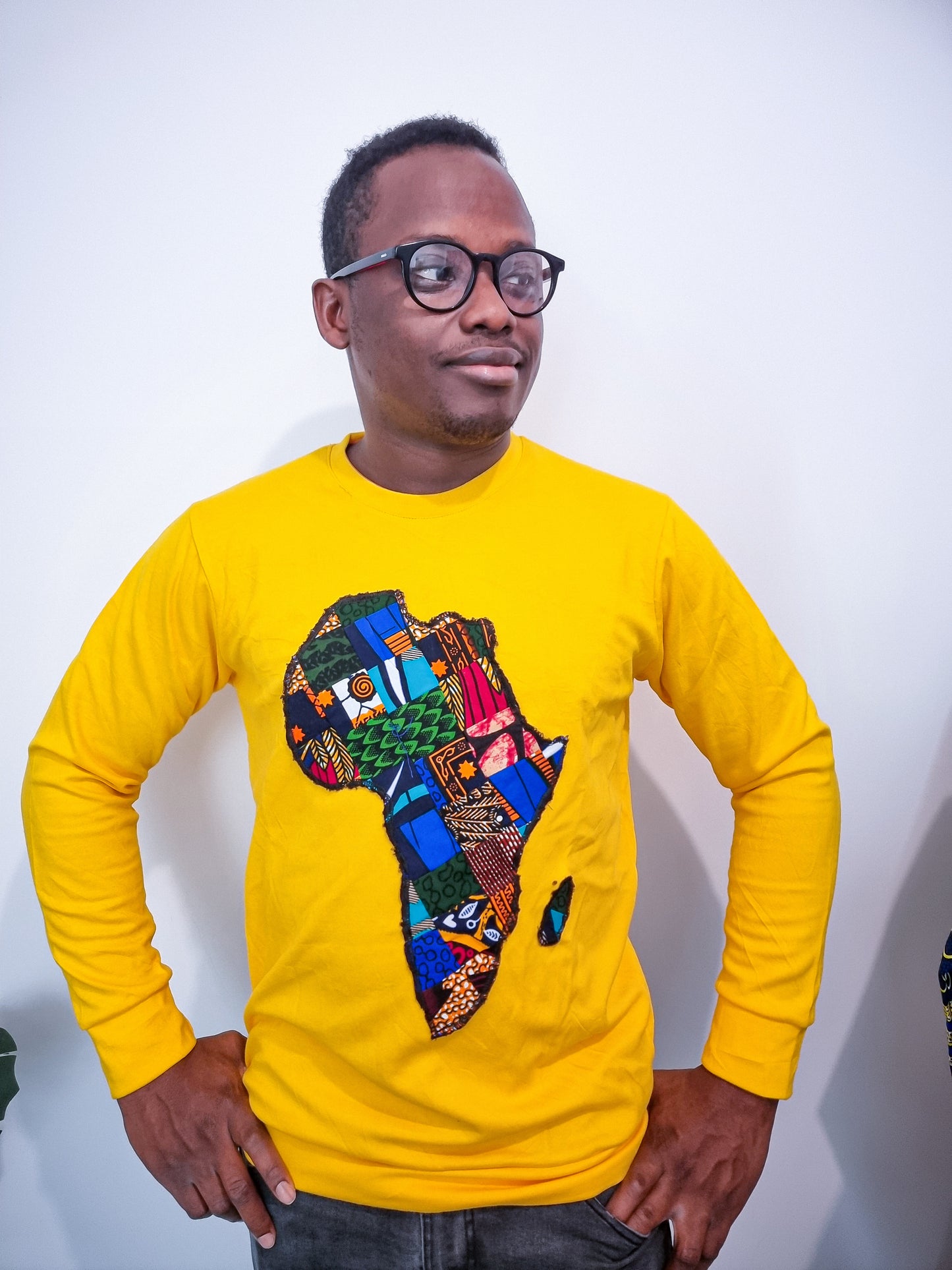 YELLOW JUMPER WITH AFRICAN MAP EMBROIDERY