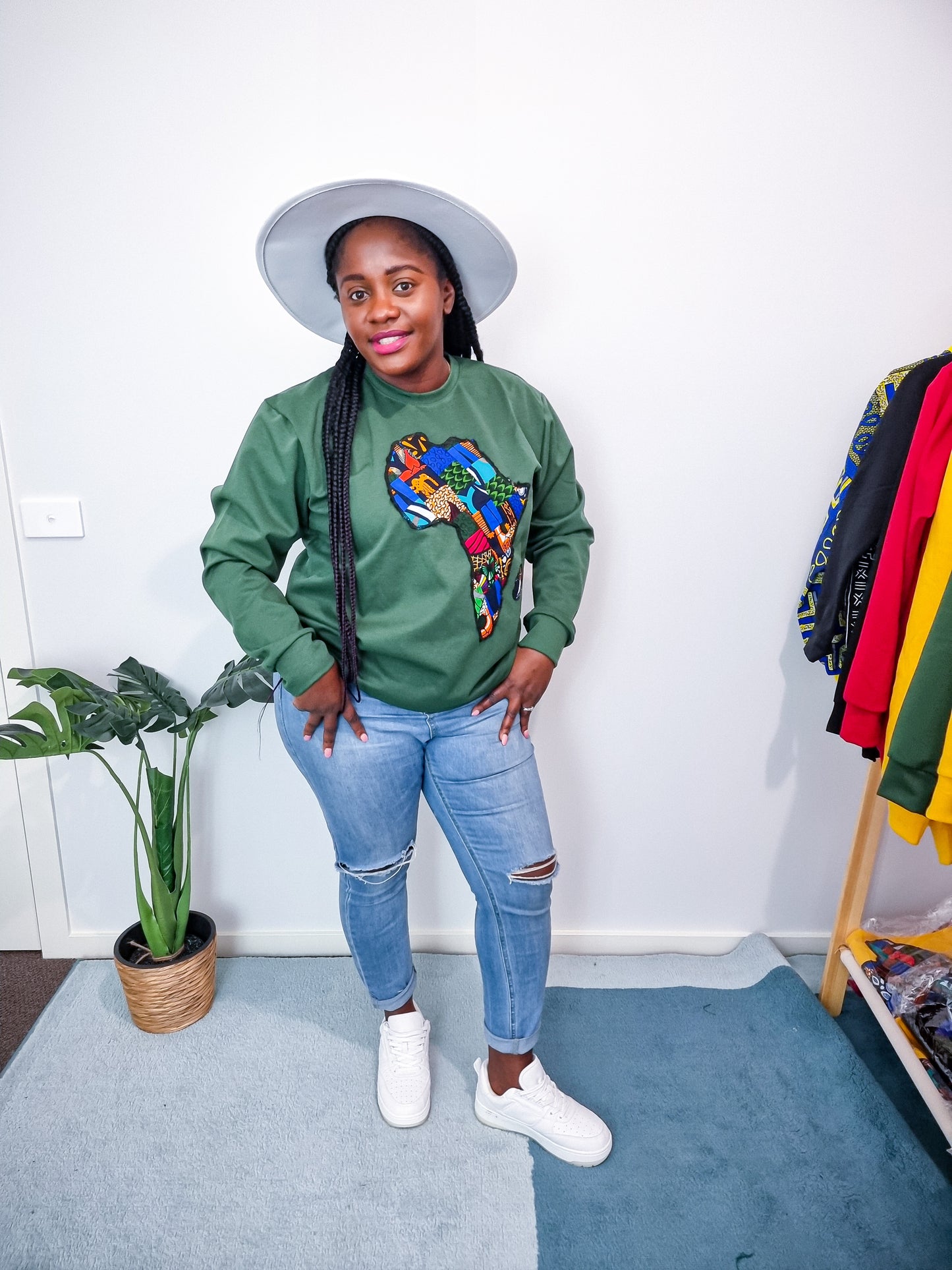 GREEN JUMPER WITH AFRICAN MAP EMBROIDERY