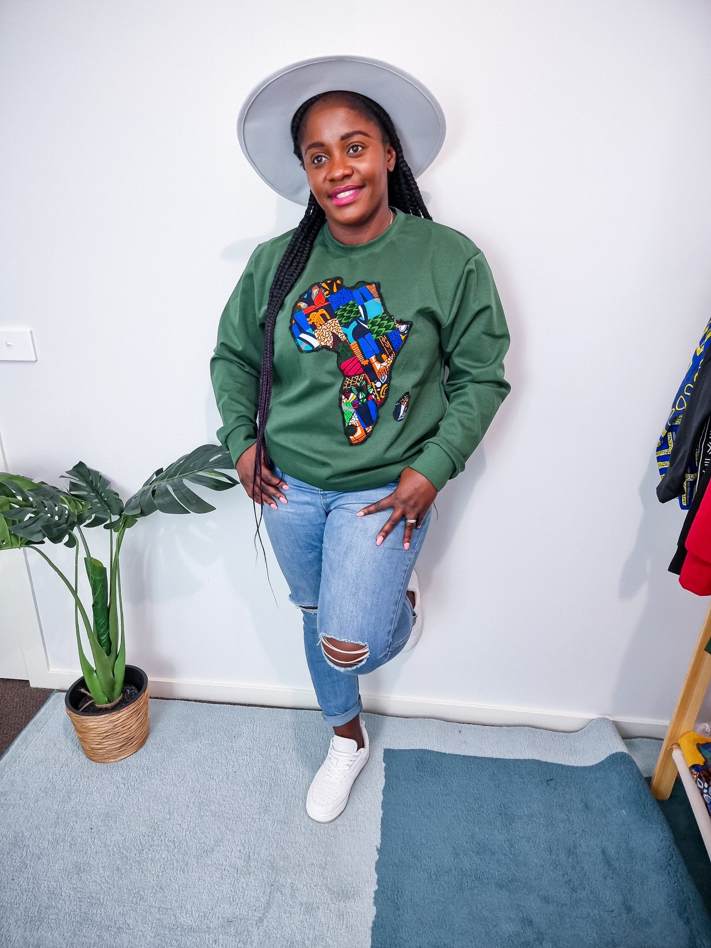 GREEN JUMPER WITH AFRICAN MAP EMBROIDERY